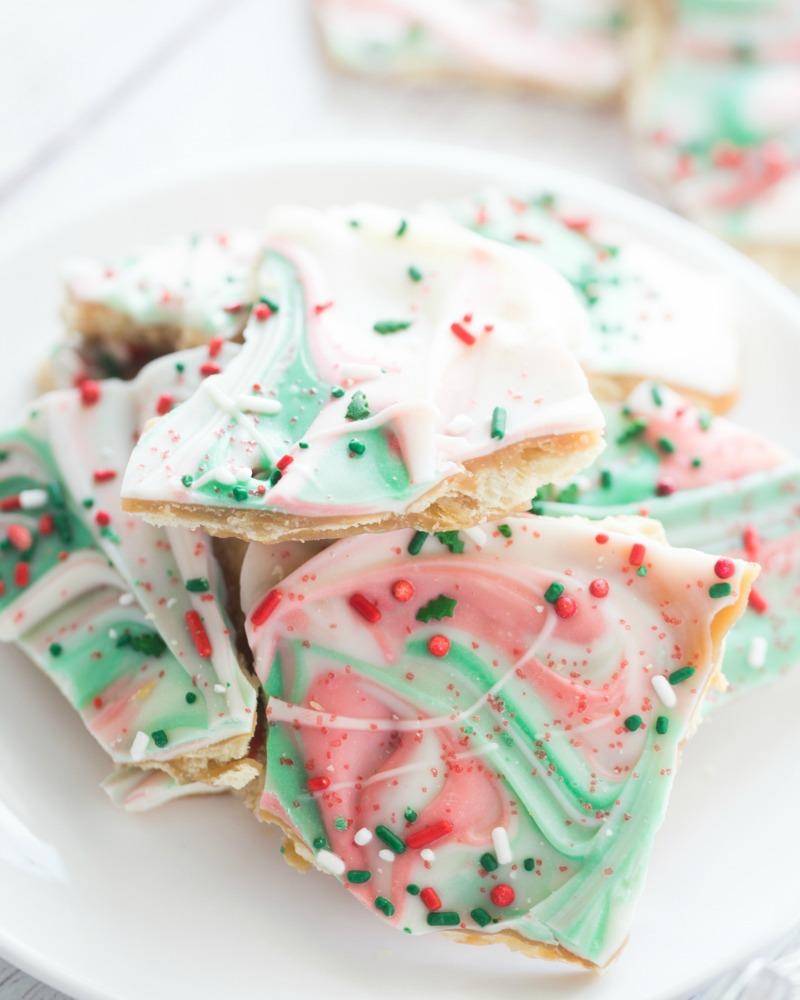 Don't miss this Easy Christmas Crack Recipe for one of the best holiday party treats and gift recipes for your friends, neighbors, and co-workers!
