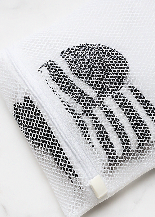 fuzzy socks in a zip top laundry bag for swiffer diy hack