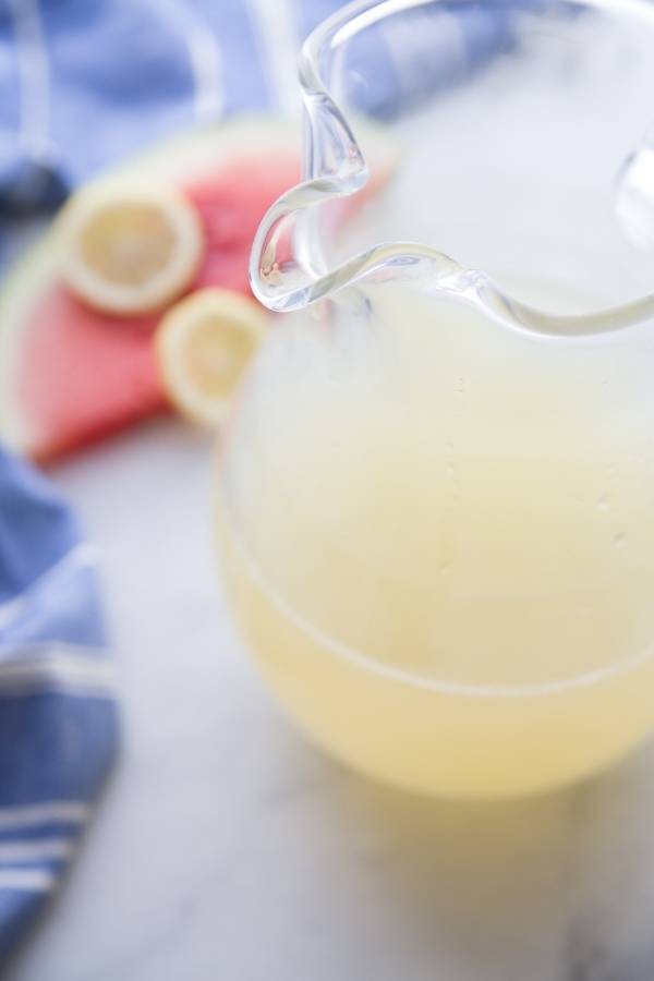 Frozen Watermelon Lemonade is so easy to make! I used a homemade lemonade but you are welcome to use store bought for these watermelon lemonade slushies. #watermelon #slush #slushies #lemonade #homemade #frozen #summerdrink #easy #partydrink watermelon lemonade slush