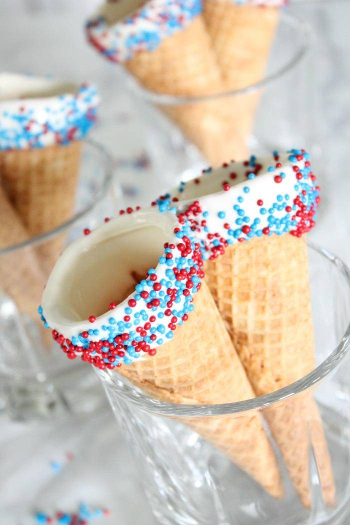 I am loving these DELICIOUS 4th of July Ice Cream Cones! They're the PERFECT sweet treat this 4th of July when you add ice cream plus they're super easy to make, my kids loved them!