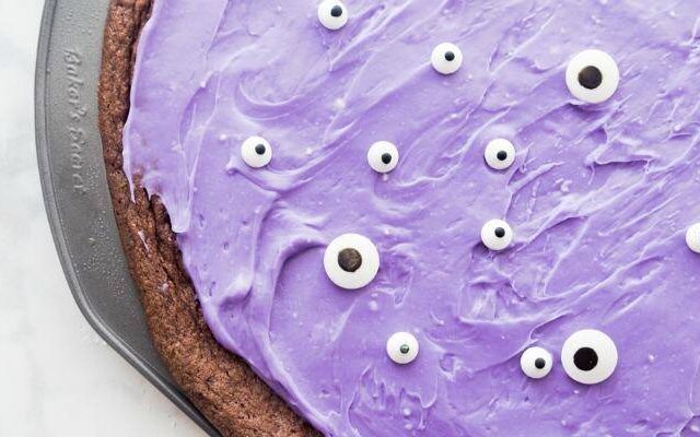 This Monster Brownie Pizza Recipe is the Perfect Holiday Dessert for Halloween! Easy Spooky and Scary Treats for Kids and Adults for Parties or Classrooms!