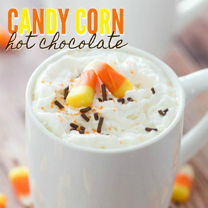 This Candy Corn Hot Chocolate Recipe is Made in the Crockpot and the perfect Slow Cooker Drink Recipe for Halloween or Your Next Fall Bonfire!