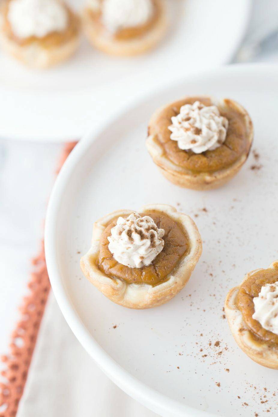 Mini Pumpkin Pie Bites are an Easy Dessert Recipe for Halloween, Thanksgiving, or Christmas! Pumpkin Treats and Snack Recipes better than traditional pie! Mini pumpkin pies are a fantastic dessert. #pie #recipe #pumpkin #fall #bites #mini #holiday #party Pumpkin Bites! Easy Holiday Dessert Recipe for Thanksgiving or Christmas! Bite Sized Treats for Parties!