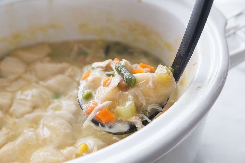 Easy Crockpot Chicken and Dumplings With Biscuits