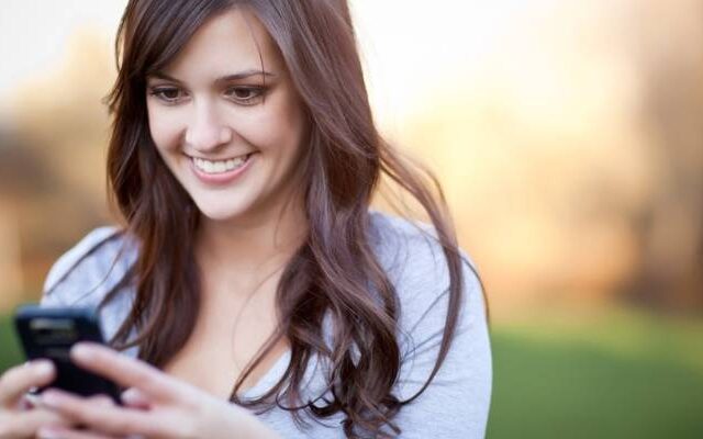 Girl looking at smart phone