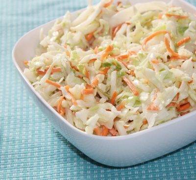 Coleslaw in a bowl on table 