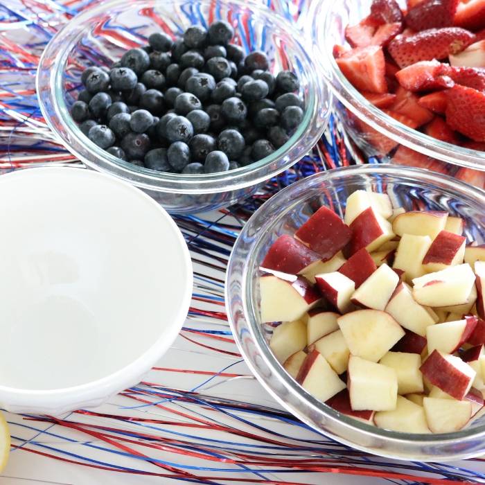 fruit salad ingredients in bowls 