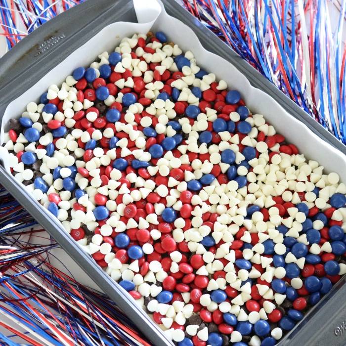 4th of July Magic Cookie Bars are one simple patriotic dessert. Layers of ingredients bake up into chewy and sweet cookie bars. #patriotic #4thofJuly #dessert #magicbars #cookiebars #easydessert #summerdessert _patriotic Magic Cookie Bars