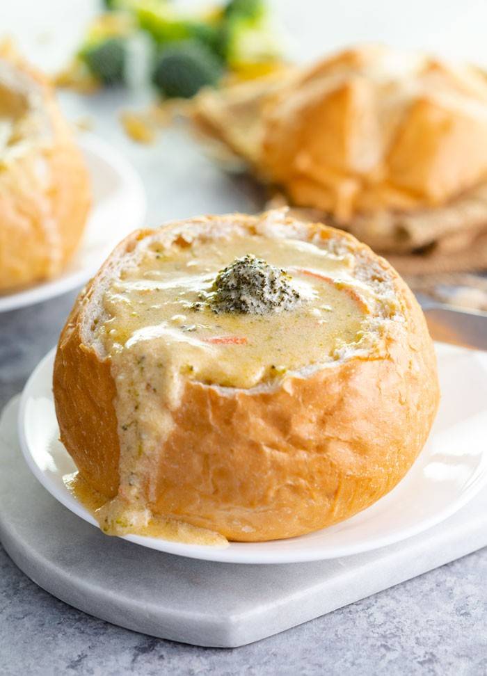 panera broccoli cheddar soup in bread bowl on plate