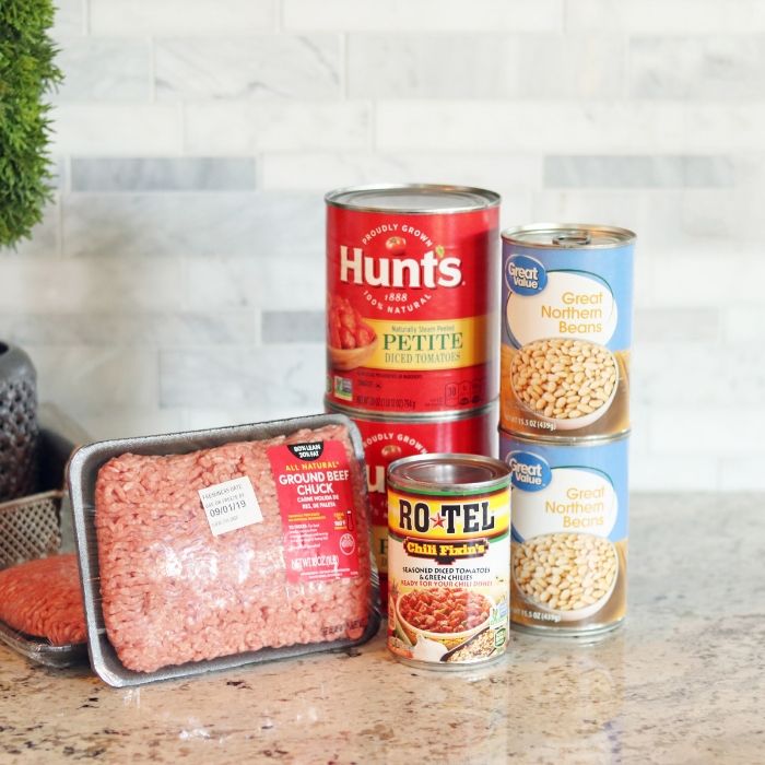 This 4 Ingredient White Bean Chili is so easy to make. Slow cooker white bean chili is fast to prep and savory for all your family to enjoy. #soup #chili #4ingedient #whitebean #groundbeef #recipe #dinner #easy #affordable #slowcooker #crockpot slow cooker chili