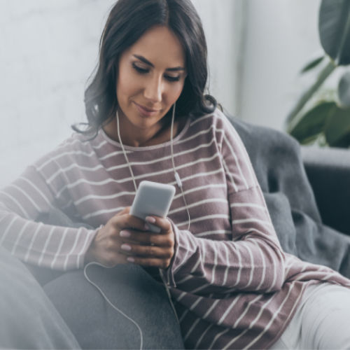 Audible Free Trial - woman on cell phone