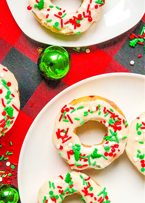 christmas confetti donuts on a white serving platter