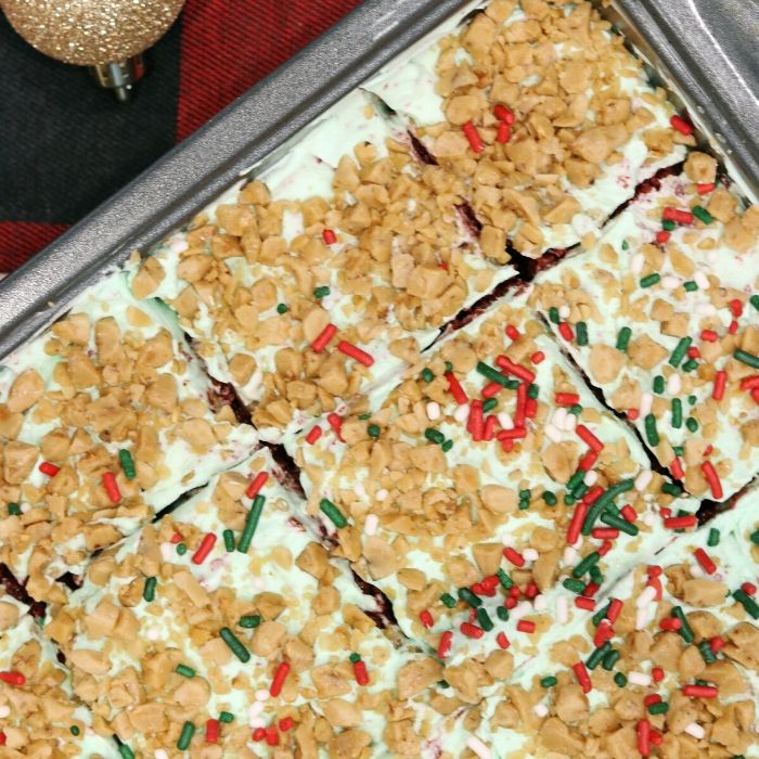 Here is a better than ... Christmas morning cake recipe. A red velvet poke cake that is topped with whipped cream and sprinkles and more. #cake #Christmas #betterthan #christmasmorning #breakfast #dessert #recipe #pokecake red velvet cake recipe