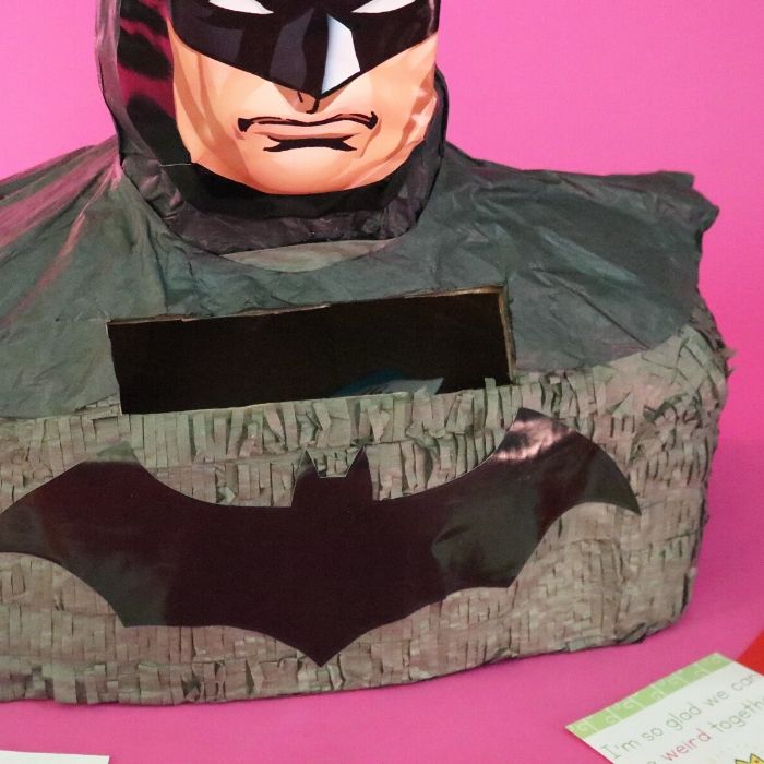 Learn how to make a Valentine Box out of a Pinata! This is a quick and easy way to really make a fun and colorful Valentine's Day box in just a minute or two. #passion4savings #pinata #howto #make #valentinebox #diy #easy #valentinesday #forkids #fun #easy #craft batman valentine box