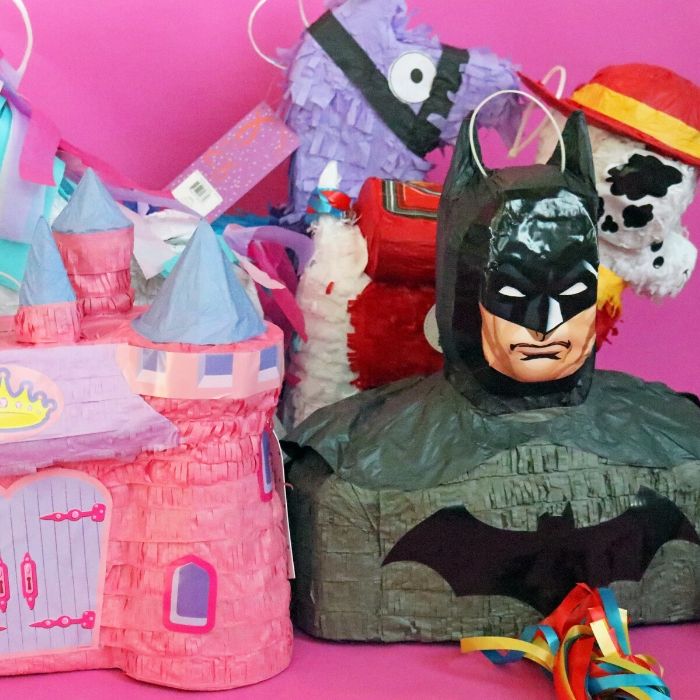 Learn how to make a Valentine Box out of a Pinata! This is a quick and easy way to really make a fun and colorful Valentine's Day box in just a minute or two. #passion4savings #pinata #howto #make #valentinebox #diy #easy #valentinesday #forkids #fun #easy #craft pinata valentine box