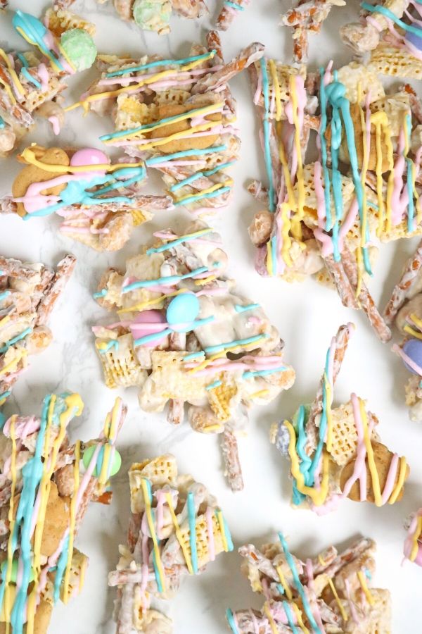 Easter bunny trash is a sweet and salty no bake Easter Dessert. A twist on the classic white trash dessert we all know and love. #Passion4Savings #easter #dessert #nobake #sweetandsalty #easy #pastel #colorful #kidfriendly #whitetrash easter no bake recipe