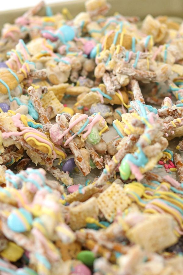 Easter bunny trash is a sweet and salty no bake Easter Dessert. A twist on the classic white trash dessert we all know and love. #Passion4Savings #easter #dessert #nobake #sweetandsalty #easy #pastel #colorful #kidfriendly #whitetrash easter recipe