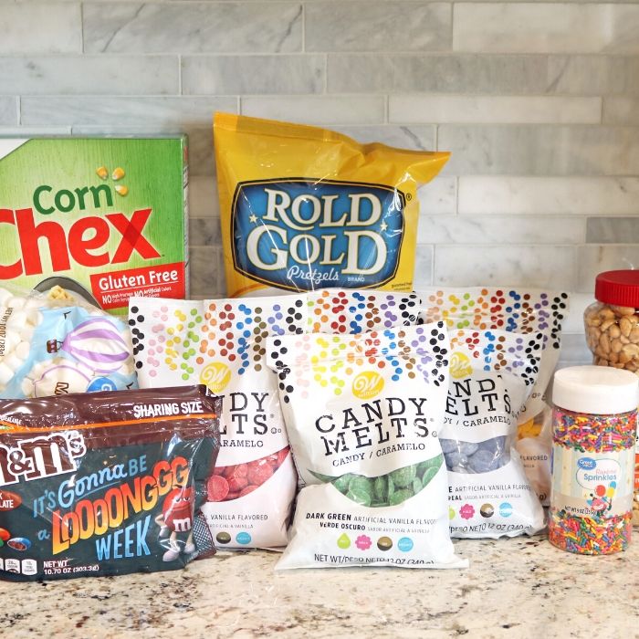 This Rainbow Trash Recipe is a perfect mix of sweet and salty in every bite. Raid your pantry for all the ingredients needed in this colorful candy trash recipe. #rainbow #sweet #salty #passion4savings #dessert #stpatricksday #ideas #forkids #fun #nobake st patricks day dessert