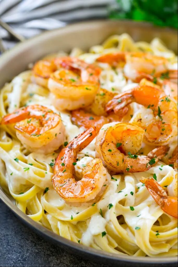 shrimp and pasta in a bowl 