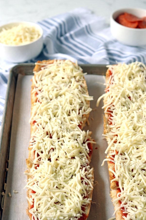 french bread pizza on cooking pan 