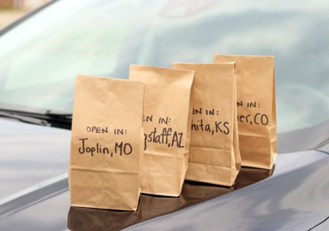 travel bags on top of a car