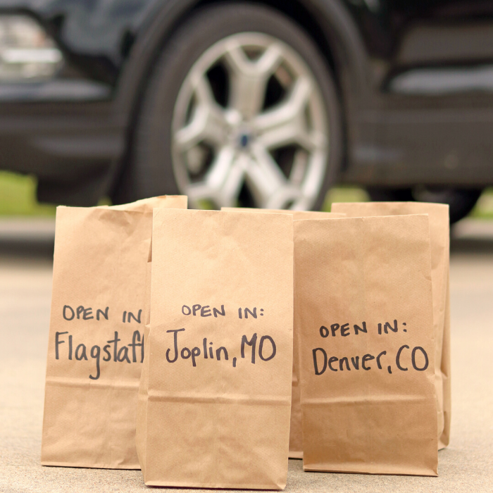 brown paper bags with states written on them 
