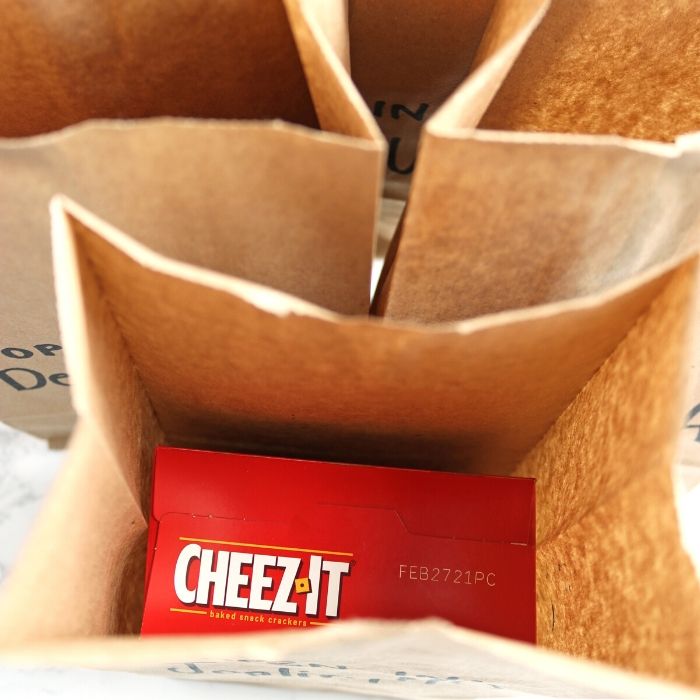 paper bag with cheez its in one bag