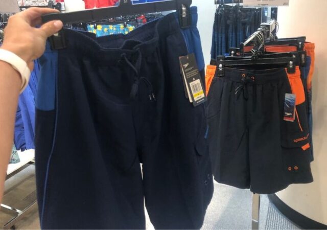 Speedo Swimsuits on Sale - swim trunks hanging in store