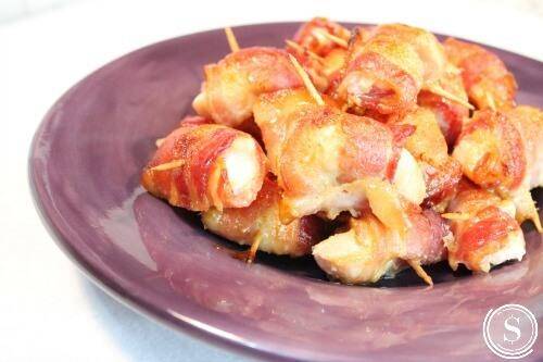 bacon wrapped chicken on a plate 
