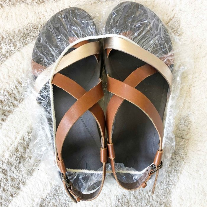 pair of shoes in a shower cap