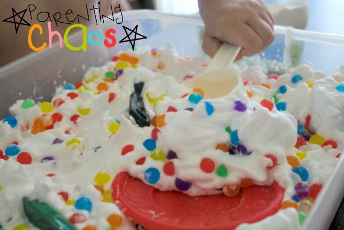 water beads and shaving cream in a bucket 