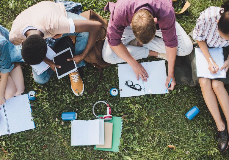 Student Discounts - College Students studying outside