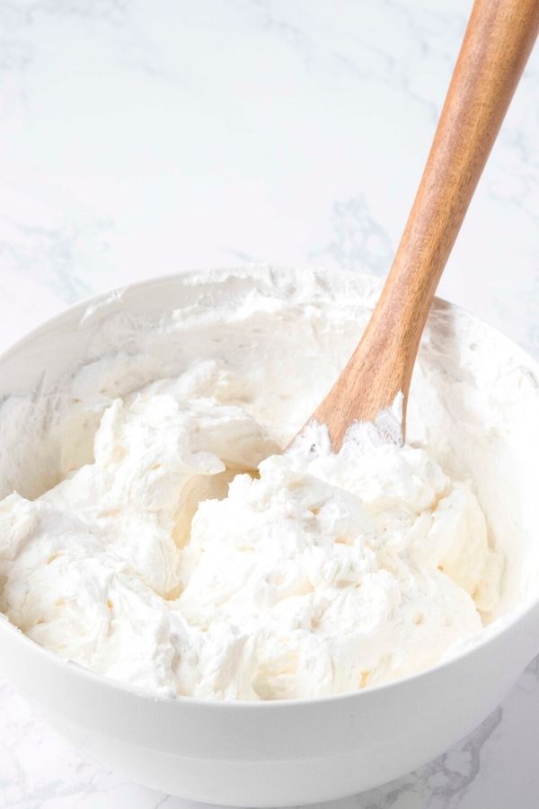 cool whip and cheesecake filling mixed together 