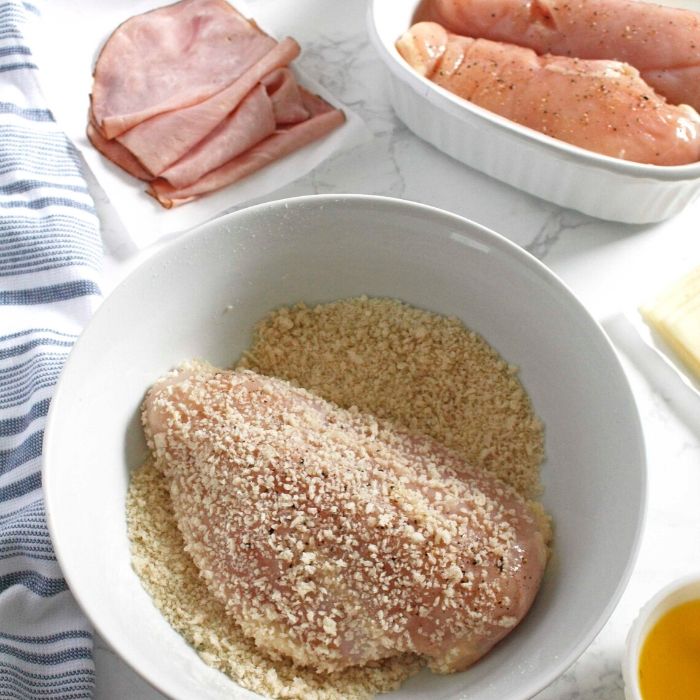 Chicken Cordon Bleu is an easy pan-fried cordon blue that is then topped with ham and Swiss cheese. Melt and serve an incredible easy chicken recipe! A fantastic easy weeknight meal that takes minimal prep work. #chicken #cordon #blue #Swiss #pan #panfried #easy #homemade #fromscratch #quick #passion4savings chicken breast in panko bread crumbs