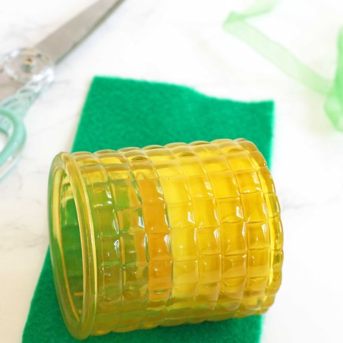 Make this easy pineapple candle as a gift idea to give to a loved one, neighbor or even a back to school teachers gift! A Dollar Tree craft that is easy! #passion4savings #pineapple #craft #candle #gift #easy #freeprintable #dollartree #dollarstore #summer candle with felt by it