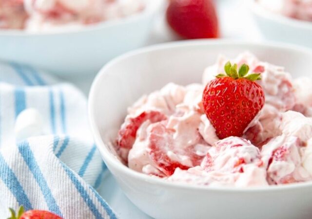 strawberry salad in a white bowl