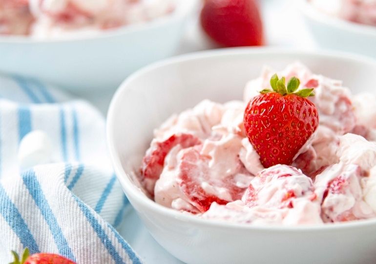 strawberry salad in a white bowl