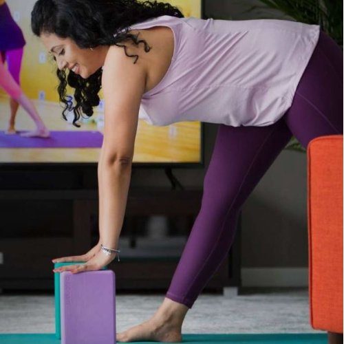 Try Yoga International for Free - Woman in yoga pose 