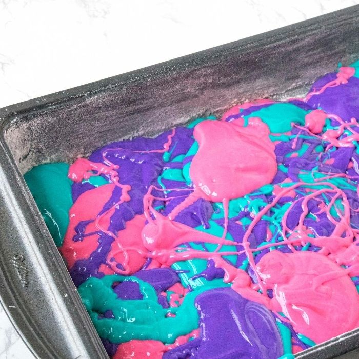 tie dye cake batter in pan 