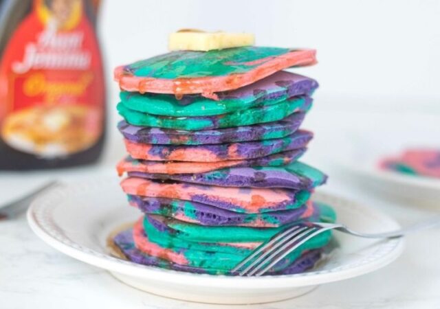 stack of pancakes on a white plate