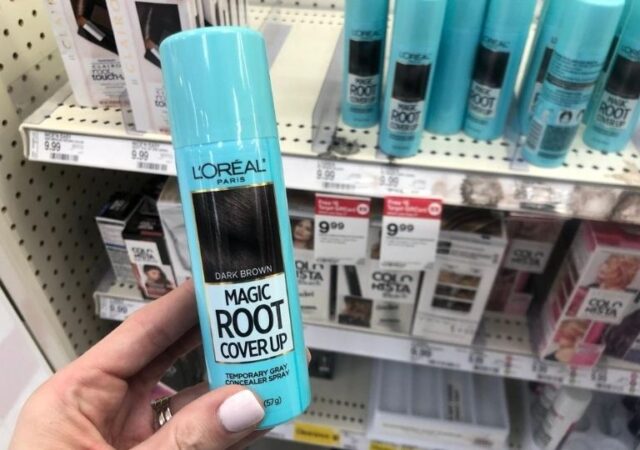 L'Oreal Root Cover Up on Sale - holding l'oreal magic root cover up in store