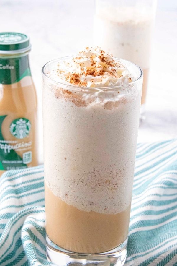 Try my pumpkin spice frappuccino hack for a quick and easy 3 ingredient pumpkin spice frappuccino recipe! A must make coffee drink at home. #pumpkin #pumpkinspice #frappuccino #drink #frozen #ice #pumpkinspicedrink #easy #quick starbucks drink recipe