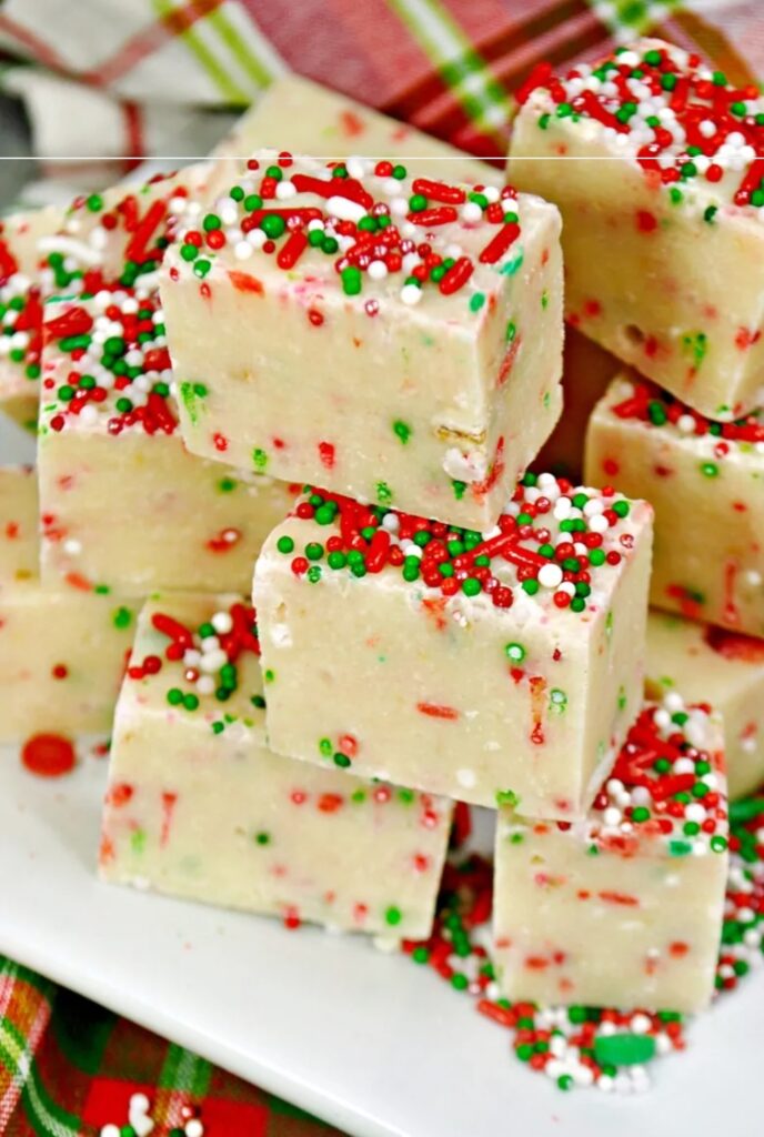 sugar cookie fudge on a table with christmas sprinkles 