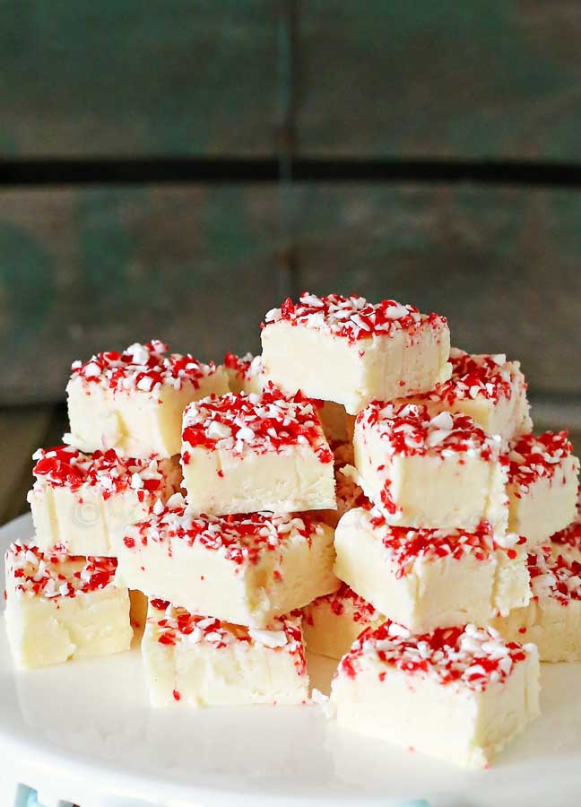 candy cane fudge stacked on top of each other on a platter 
