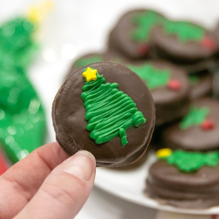 holding a christmas oreo 