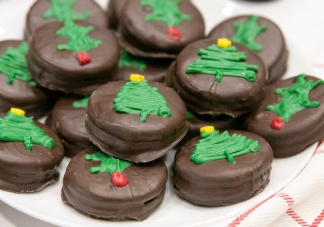 stacked holiday oreos on a platter
