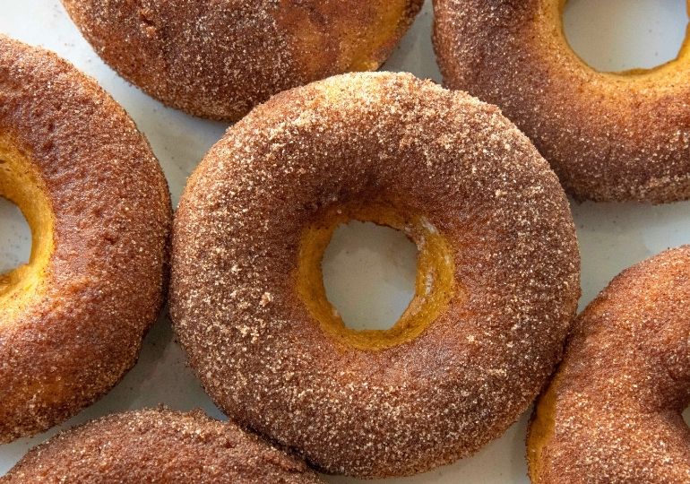 pumpkin donuts on a platter