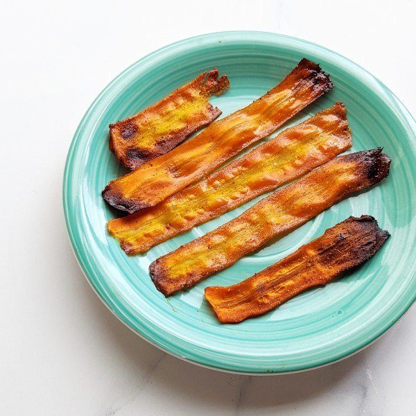 carrot bacon on a plate 