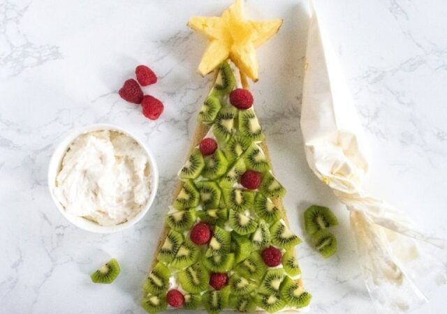 Christmas tree fruit pizza on the table