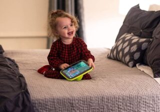 Animal Island Kids Tablet on Sale - girl playing with tablet